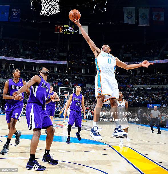 Russell Westbrook of the Oklahoma City Thunder goes to the basket against John Salmons of the Sacramento Kings at the Ford Center on February 8, 2009...