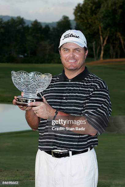 Vance Veazey holds the winner's trophy after the final round of the Panama Digicel Championship held at Club de Golf de Panama on February 8, 2009 in...