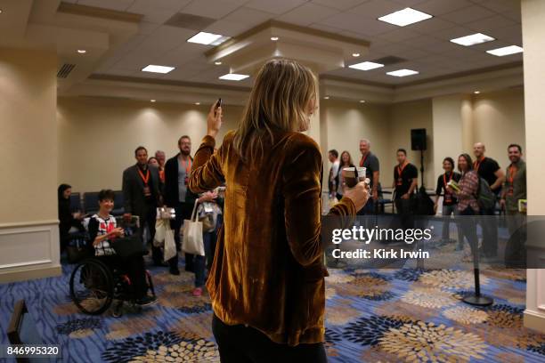 Maria Sharapova takes pictures of the room where she was signing books during the Summit of Greatness on September 14, 2017 in Columbus, Ohio.