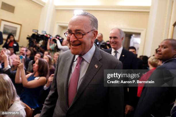 Senate Minority Leader Chuck Schumer arrives at a news conference about the Child Care for Working Families Act at the U.S. Capitol September 14,...