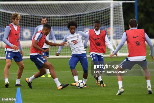 Marcos Alonso, Jake Clarke-Salter, Willian and Charly Musonda of Chelsea during a training session at Chelsea Training Ground on September 14, 2017...