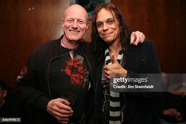 April 15: Chris Slade and Eric Dover pose for a portrait in Los Angeles, California on April 15, 2008.