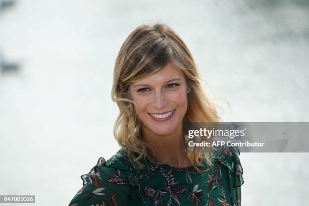 French actress Alexia Barlier poses during the 19th edition of the "Festival de fiction TV" in La Rochelle, western France, on September 14, 2017. /...