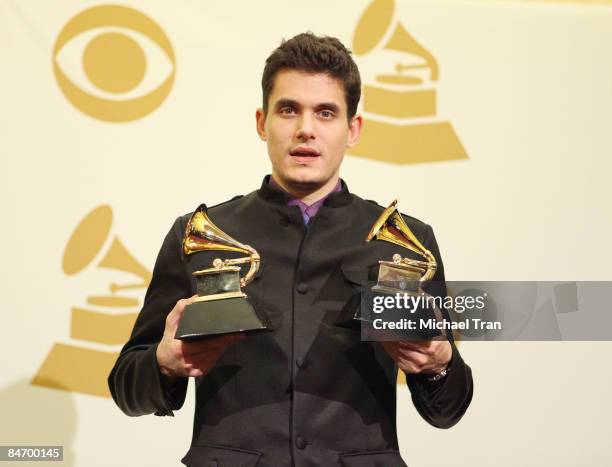 John Mayer holds the Grammy awards for the Best Male Pop Vocal Performance and Best Solo Rock Vocal Performance during the 51st Annual Grammy Awards...