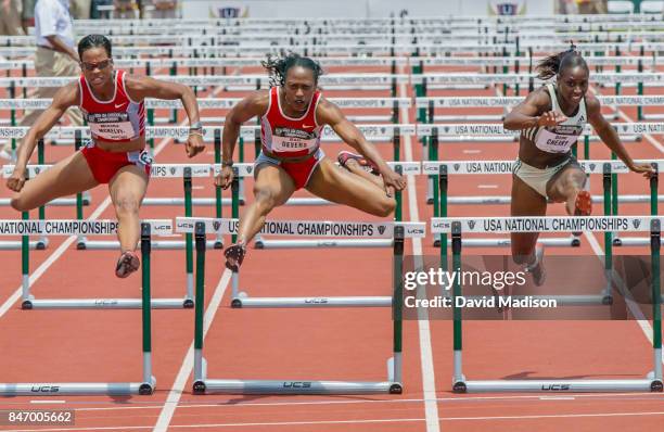 Miesha McKelvy-Jones, Gail Devers, and Damu Cherry run the final of the 100 meter hurdles event of the USA Outdoor Track and Field Championships on...