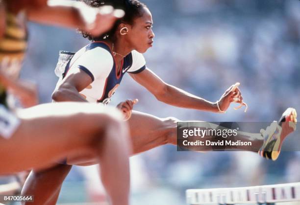 Gail Devers of the USA runs in a heat of the 100 meter hurdles event of 1996 Summer Olympics on July 29, 1996 in the Centennial Olympic Stadium in...
