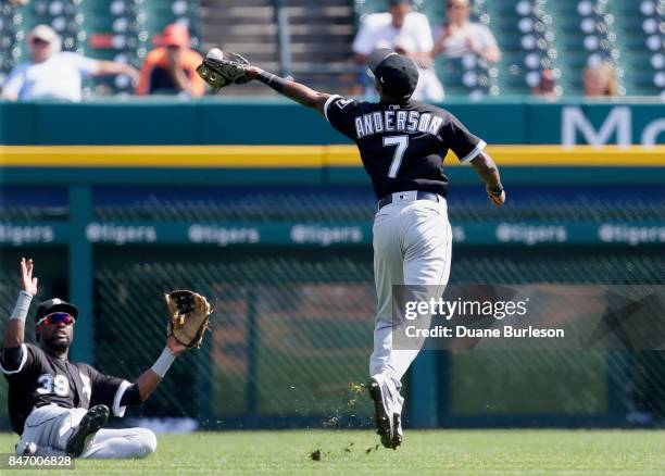 Shortstop Tim Anderson of the Chicago White Sox catches a fly ball hit by Jeimer Candelario of the Detroit Tigers as left fielder Alen Hanson of the...