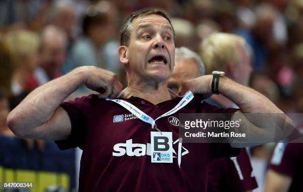 Alfred Gislason, head coach of Kiel reacts during the DKB HBL Bundesliga match between THW Kiel and DHfK Leiipzig at Sparkassen Arena on September...