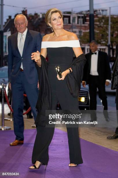 Queen Maxima of The Netherlands dressed in an jumpsuit from designer Rouland Mouret attends the opening of the new season of the Concertgebouw...