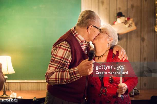 christmas and new year celebration family - hugging self stock pictures, royalty-free photos & images