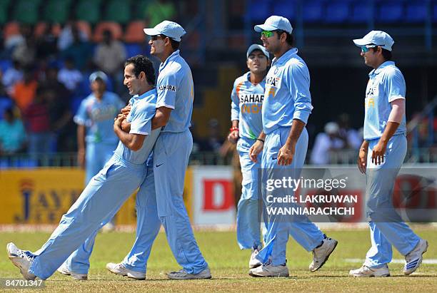 Indian cricketer Irfan Pathan celebrates with teammates Yusuf Pathan , Yuvraj Singh and Suresh Raina the dismissal of unseen Sri Lankan cricketer...