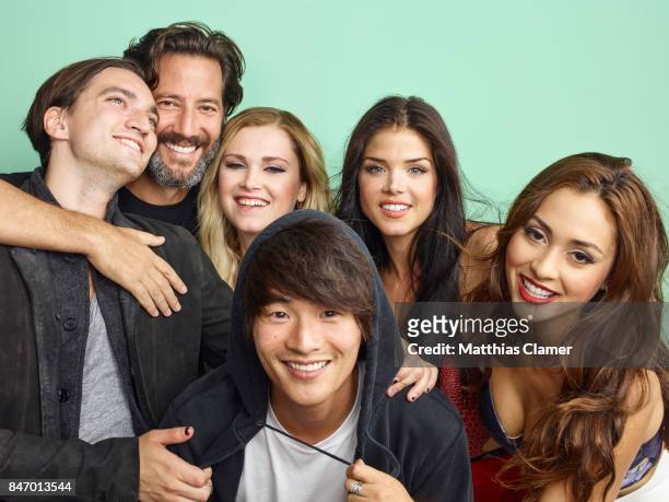 Actors Richard Harmon, Henry Ian Cusick, Eliza Taylor, Christopher Larkin, Marie Avgeropoulos, and Lindsey Morgan from 'The 100' are photographed for...