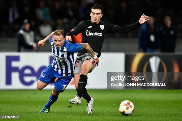 Berlin's Slovakian midfielder Ondrej Duda and Athletic's defender Asier Villalibre Molina vie for the ball during the UEFA Europa League group J...