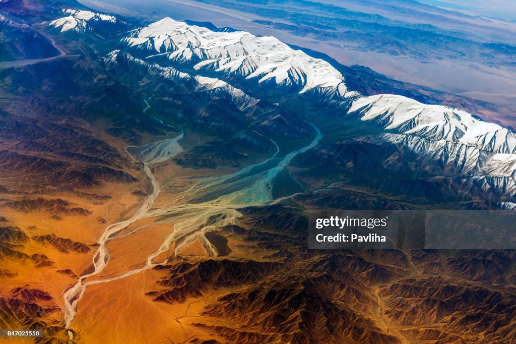 Aerial View Of Tibet And Taklamakan Desert In China Asia High Res Stock aerial-view-of-tibet-and-taklamakan-desert-in-china-asia-high-res-stock