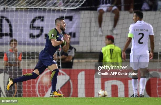 Salzbourg's midfielder from Norway Valon Berisha celebrates a goal during the Europa League football match Vitoria Guimaraes SC vs FC Red Bull...