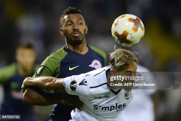 Vitoria Guimaraes' forward from Uruguay Cesar David Texeira Torres vies with Salzbourg's defender from Brazil Paulo Miranda during the Europa League...