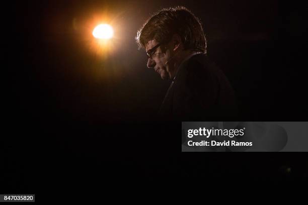 President of Catalonia Carles Puigdemont delivers a speech during a meeting to launch the Self-Determination referendum campaign on September 14,...