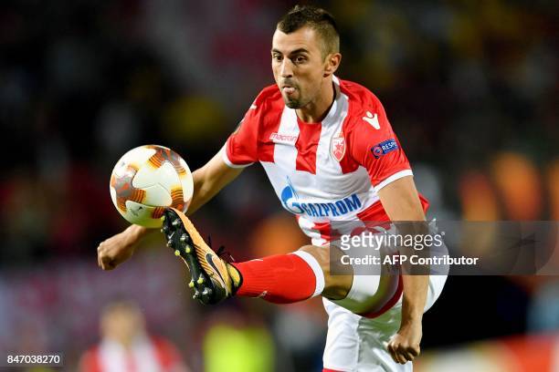 Crvena Zvezda's midfielder Nenad Krsticic controls the ball during the UEFA Europa League match between FK Crvena Zvezda Beograd and Bate Borisov at...
