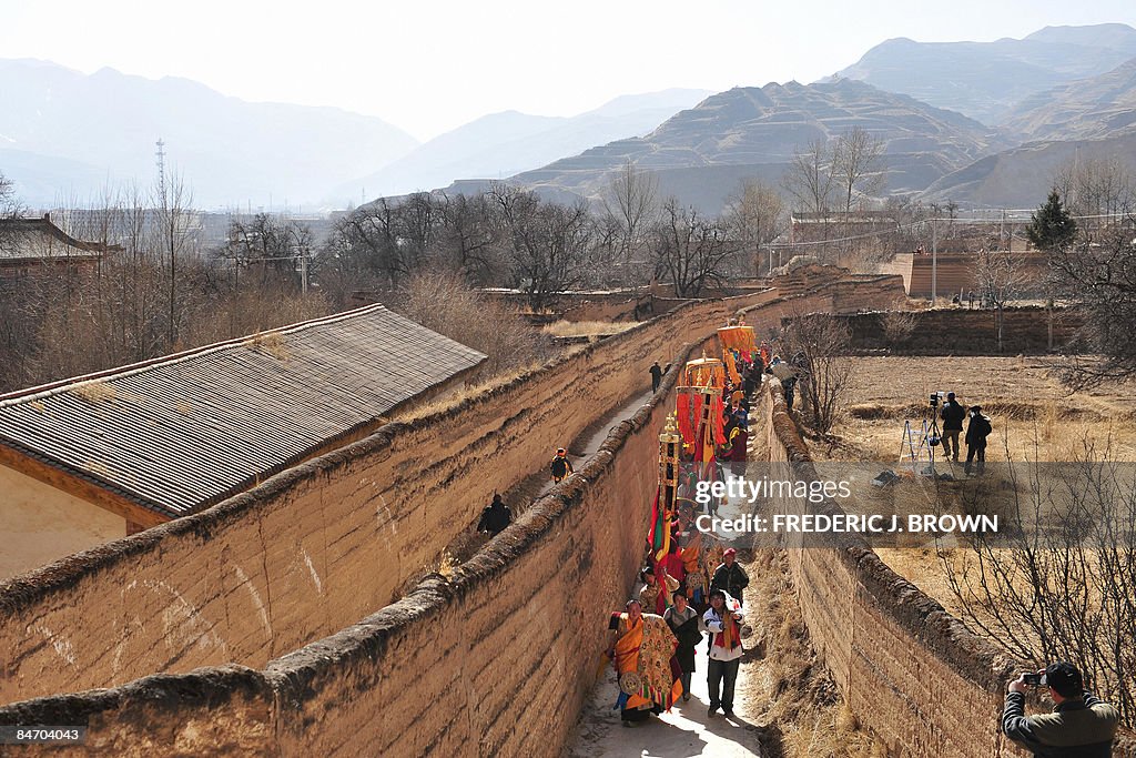 Tibetan Buddhist monks take part in a pr