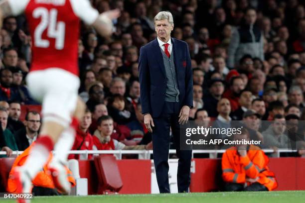 Arsenal's French manager Arsene Wenger reacts on the touchline during the UEFA Europa League Group H football match between Arsenal and FC Cologne at...