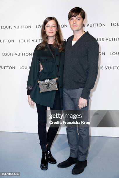 Alexandra Maria Lara and her husband Sam Riley wearing Louis Vuitton attend the 'Louis Vuitton - Time Capsule' Exhibition Opening at Franzoesisches...