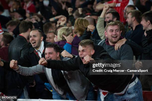 Koln fans celebrate their opening goal during the UEFA Europa League group H match between Arsenal FC and 1. FC Koeln at on September 14, 2017 in...