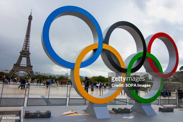 The Olympic Rings being placed in front of the Eiffel Tower in celebration of the French capital won the hosting right for the 2024 summer Olympic...