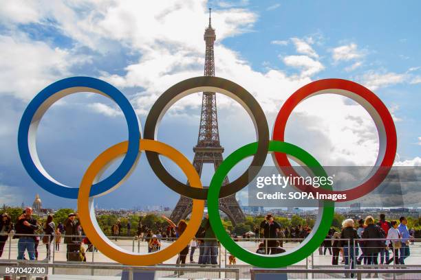 The Olympic Rings being placed in front of the Eiffel Tower in celebration of the French capital won the hosting right for the 2024 summer Olympic...