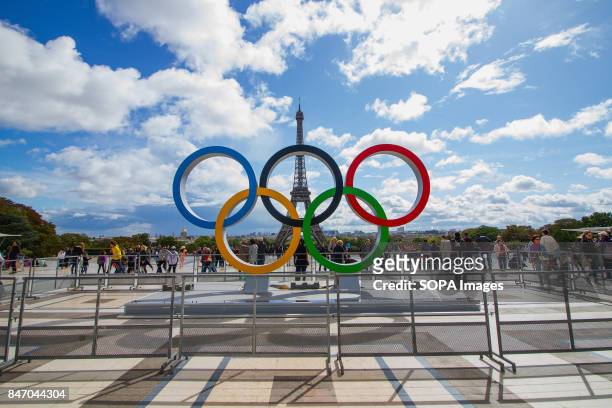 The Olympic Rings being placed in front of the Eiffel Tower in celebration of the French capital won the hosting right for the 2024 summer Olympic...