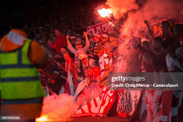 Koln fans light flares during the UEFA Europa League group H match between Arsenal FC and 1. FC Koeln at on September 14, 2017 in London, England.