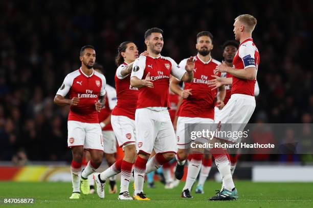 Sead Kolasinac of Arsenal celebrates scoring the first Arsenal goal with team mates during the UEFA Europa League group H match between Arsenal FC...