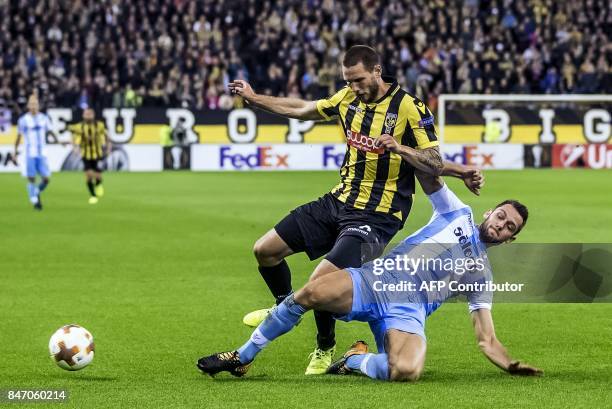 Vitesse's Tim Matavz vies for the ball with Lazio's Stefan de Vrij during the UEFA Europa League Group K football between Vitesse Arnhem and SS Lazio...