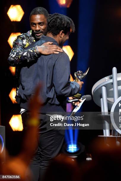 Sampha winner of the Hyundai Mercury Prize 2017 on stage with Idris Elba at Eventim Apollo on September 14, 2017 in London, England.