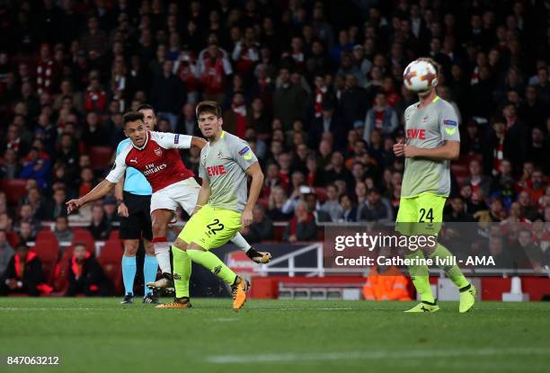 Alexis Sanchez of Arsenal scores a goal to make it 2-1 during the UEFA Europa League group H match between Arsenal FC and 1. FC Koeln at Emirates...