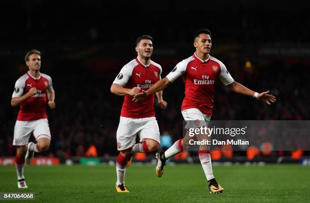 Alexis Sanchez of Arsenal celebrates scoring the 2nd arsenal goal with Sead Kolasinac of Arsenal during the UEFA Europa League group H match between...