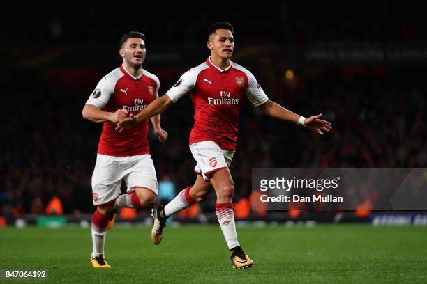 Alexis Sanchez of Arsenal celebrates scoring the 2nd arsenal goal with Sead Kolasinac of Arsenal during the UEFA Europa League group H match between...