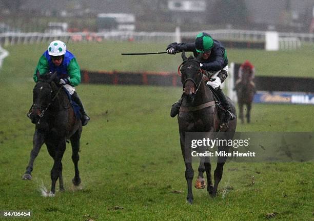 Tony McCoy on Restless d'Artaix holds on to beat Timmy Murphy on The Package and record his 3000th winner in the Tyser & Co Beginners� Steeple Chase...