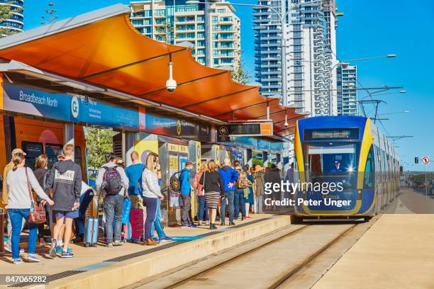 light rail tram station on the gold coast streets,gold coast,queenslan,australia - gold coast light rail stock pictures, royalty-free photos & images