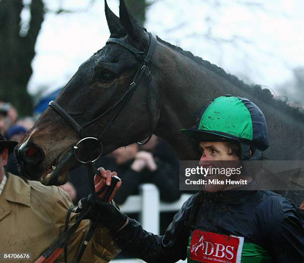 Tony McCoy in the winner's enclosure after securing his 3000th winner on Restless d'Artaix in the Tyser & Co Beginners� Steeple Chase at Plumpton...