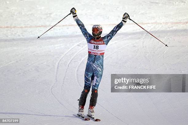 Norway's Aksel Lund Svindal celebrates after the men's super combined slalom at the World Ski Championships on February 9, 2009 in Val d'Isere,...