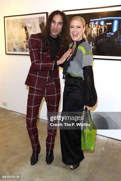 Dave Rudd and Camilla Kerslake attend the 'A Front Row Seat' photography exhibition by Kirstin Sinclair at The Subculture Archives on September 14,...