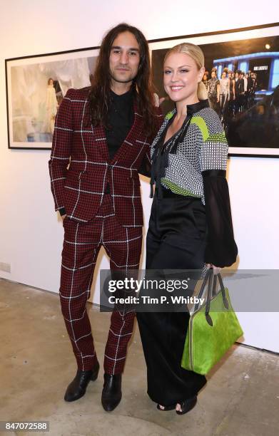 Dave Rudd and Camilla Kerslake attend the 'A Front Row Seat' photography exhibition by Kirstin Sinclair at The Subculture Archives on September 14,...