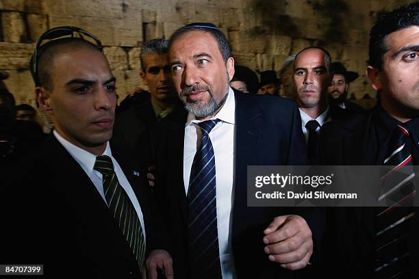 Secret Service bodyguards escort ultra-nationalist Israeli politician Avigdor Lieberman, who heads of the right-wing Yisrael Beitinu party, away from...