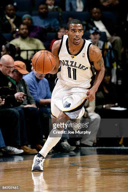 Mike Conley of the Memphis Grizzlies drives the ball up court during the game against the Houston Rockets on February 4, 2009 at FedExForum in...