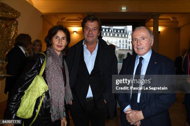 Aline Vidal, Antoine De Galbert and Francois Pinault attend exhibition 'Faire Avec' works from the Pinault Collection at 40 Rue de Sevres on...