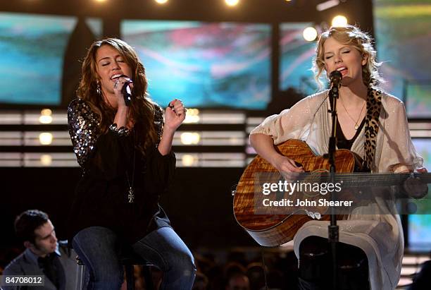 Singers Miley Cyrus and Taylor Swift onstage at the 51st Annual GRAMMY Awards held at the Staples Center on February 8, 2009 in Los Angeles,...