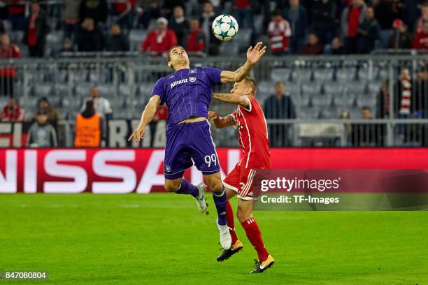 Hamdi Harbaoui of Anderlecht battle for the ball during the UEFA Champions League group B match between Bayern Muenchen and RSC Anderlecht at Allianz...