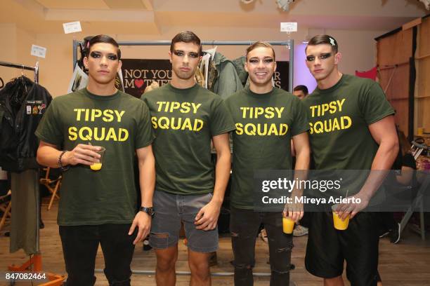 Models pose backstage at the Tumbler And Tipsy By Michael Kuluva fashion show during New York Fashion Week: Style360 at Metropolitan Pavilion on...