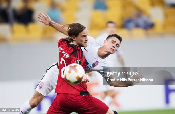 Tom Pettersson of Ostersunds FK and Artem Gordiyenko of Zorya Luhansk during the UEFA Europa League group J match between Zorya Lugansk and...