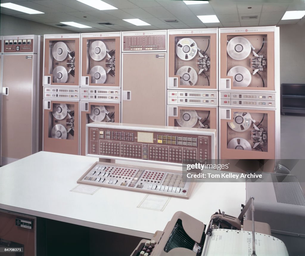 1960s Computer Workstation View of an office with an old, vintage computer set-up, 1960. United ...